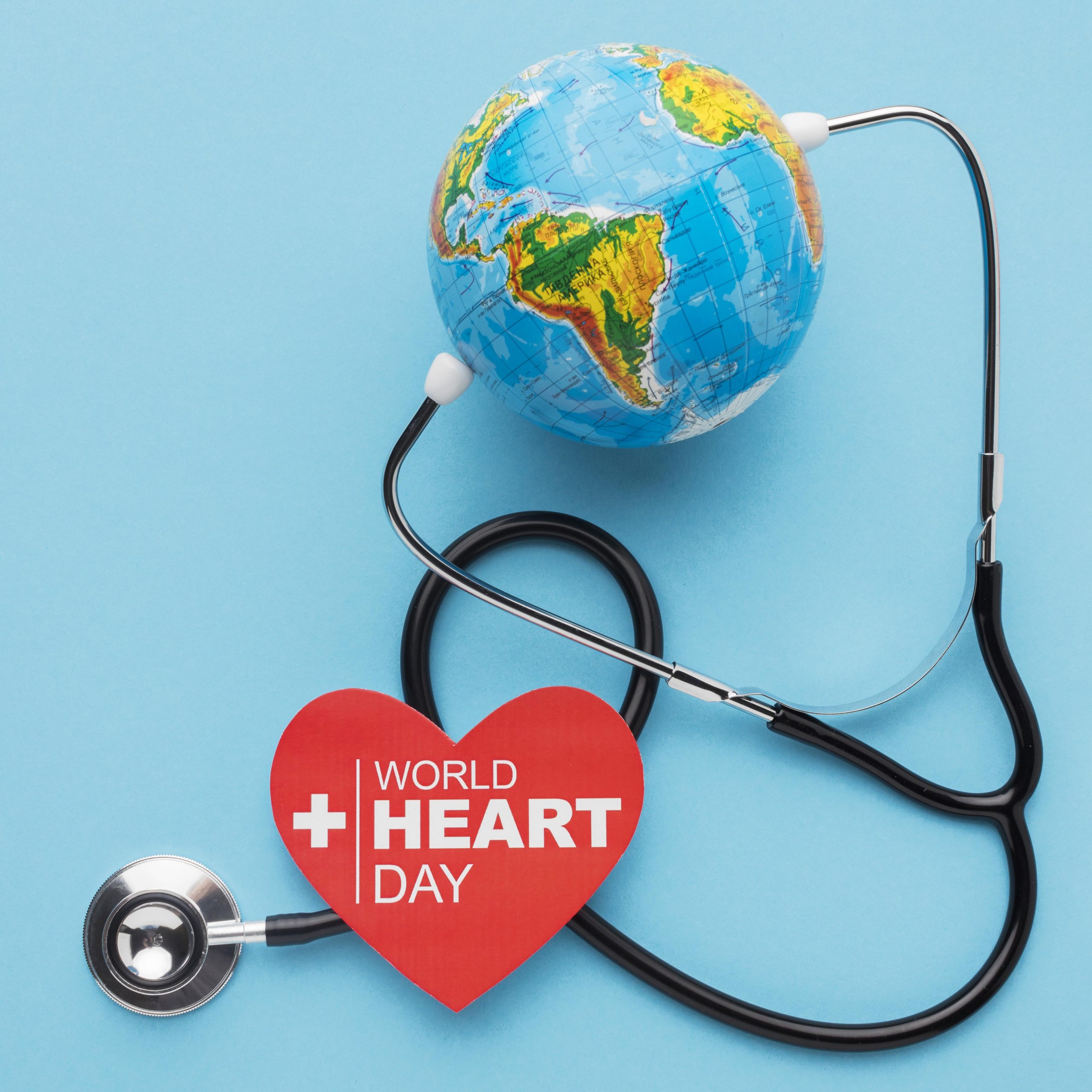 top-view-world-heart-day-concept-with-globe